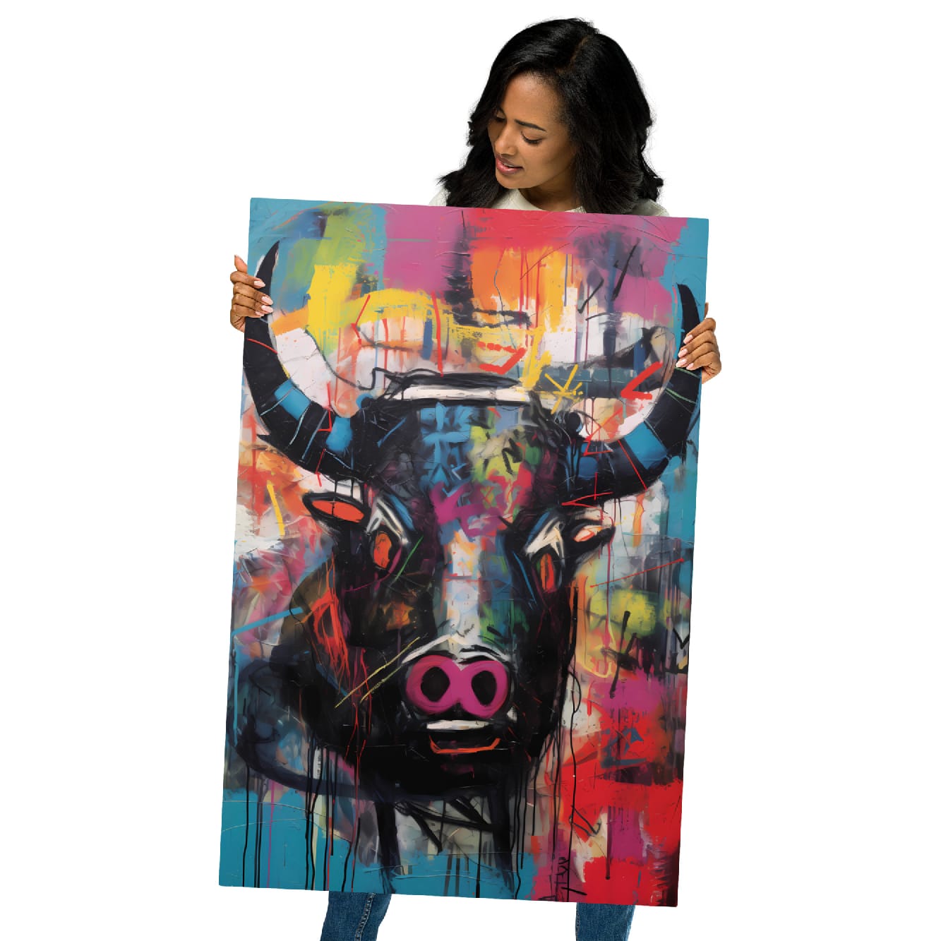 "Graffiti Bull" woman holding 24"×36" glossy metal print featuring a colorful graffiti bull head with neon pink snout, black horns, and expressive paint splatter details by GiveMeMood