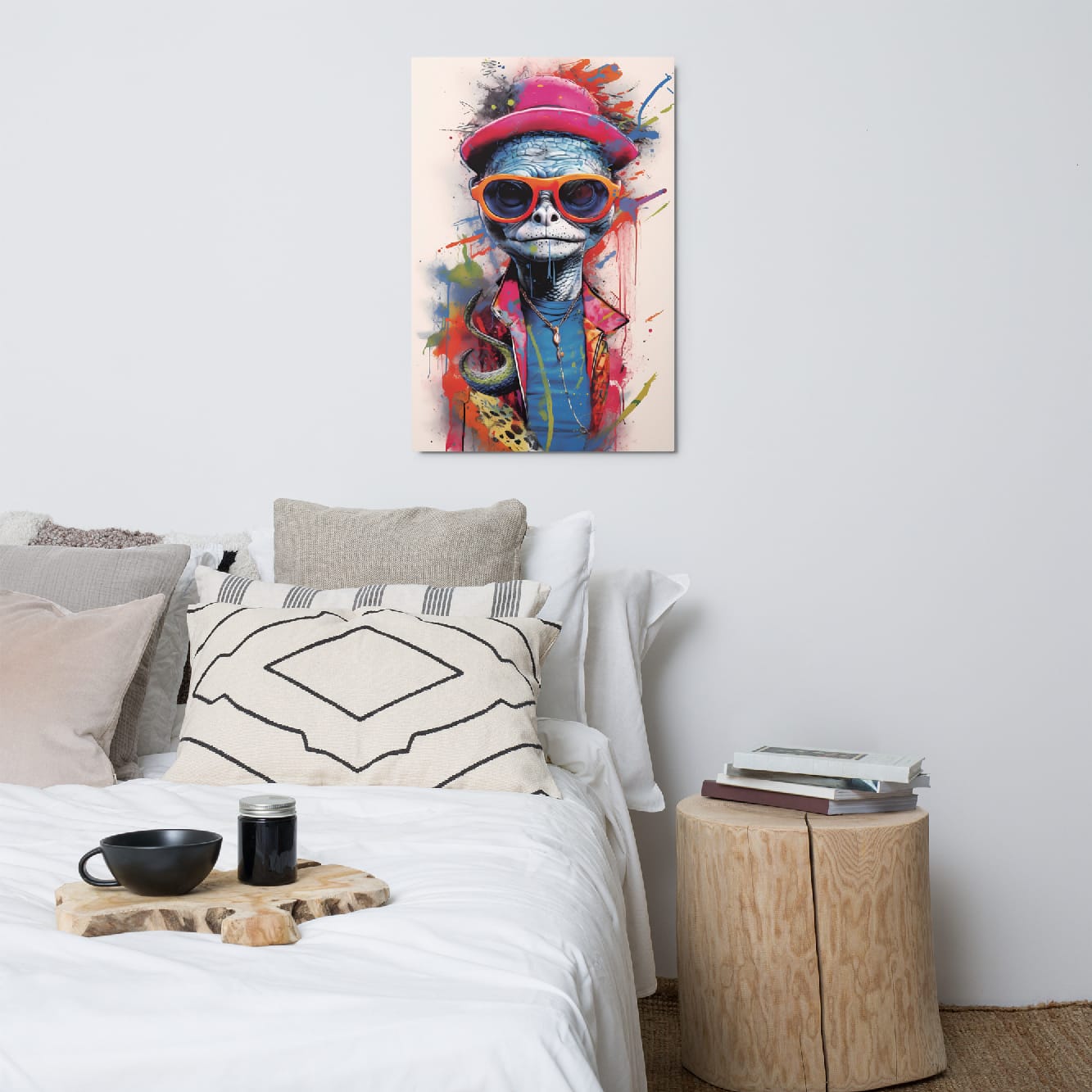 "Reptile Swagger" glossy metal poster 24"x36" above bed in a modern bedroom, colorful street-art reptile wall decor with pink hat, orange sunglasses, and bold paint splashes, by GiveMeMood